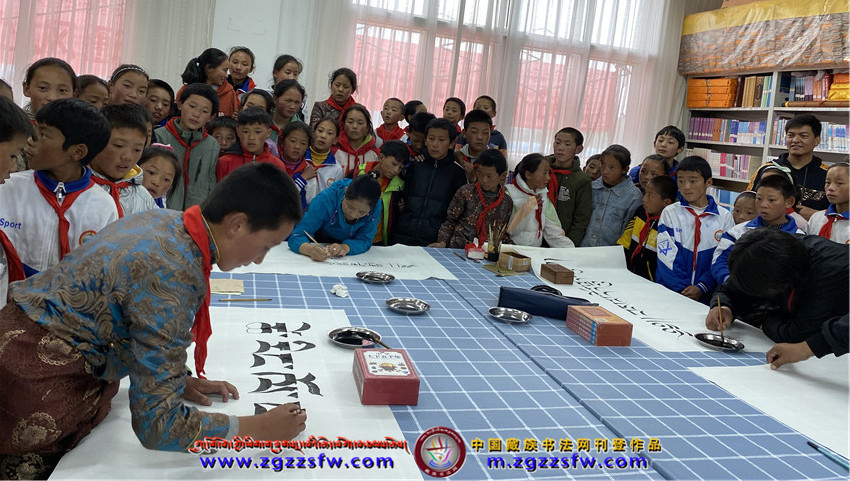 ཀླུ་ཆུའི་ཡིག་མཁན་མཐུན་ཚོགས་མཚོ་ཉིན་སློབ་གྲྭར་སྐྱོད་པ། (10).jpg
