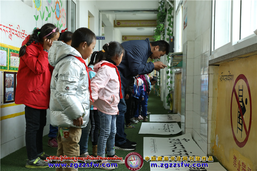 ཀླུ་ཆུའི་ཡིག་མཁན་མཐུན་ཚོགས་མཚོ་ཉིན་སློབ་གྲྭར་སྐྱོད་པ། (15).jpg